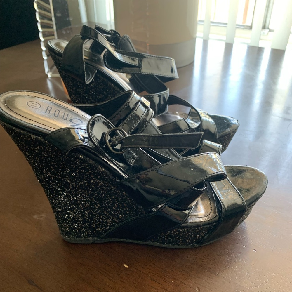 Black and glitter wedges.. Usual wear and tear.